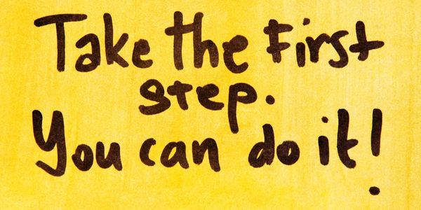 Take the first step. You can do it. Handwritten on a yellow background.