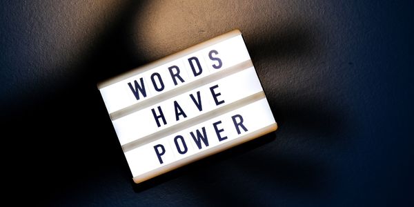 words have power written on a lightbox